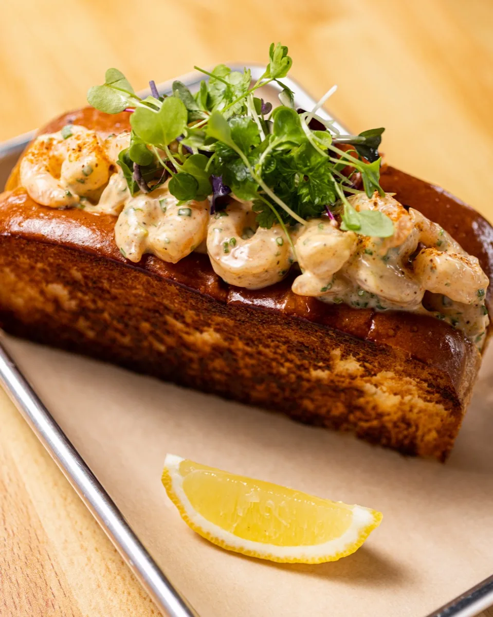 Shrimp roll finished with microgreens